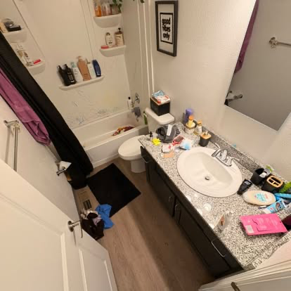 Bathroom before Elite Cleaning cleaned and reset the space